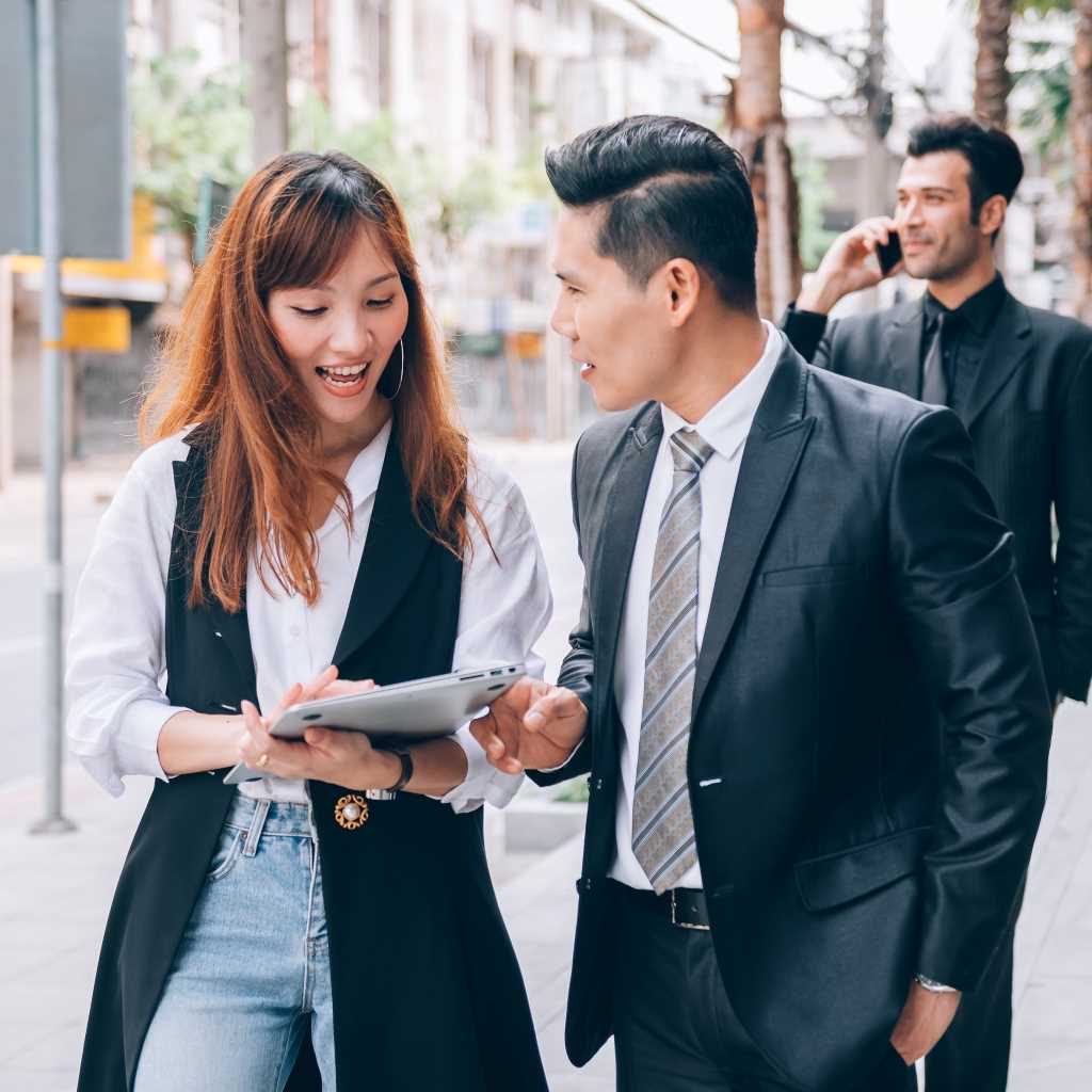 Sales Rep and client taking a walk while discussing details